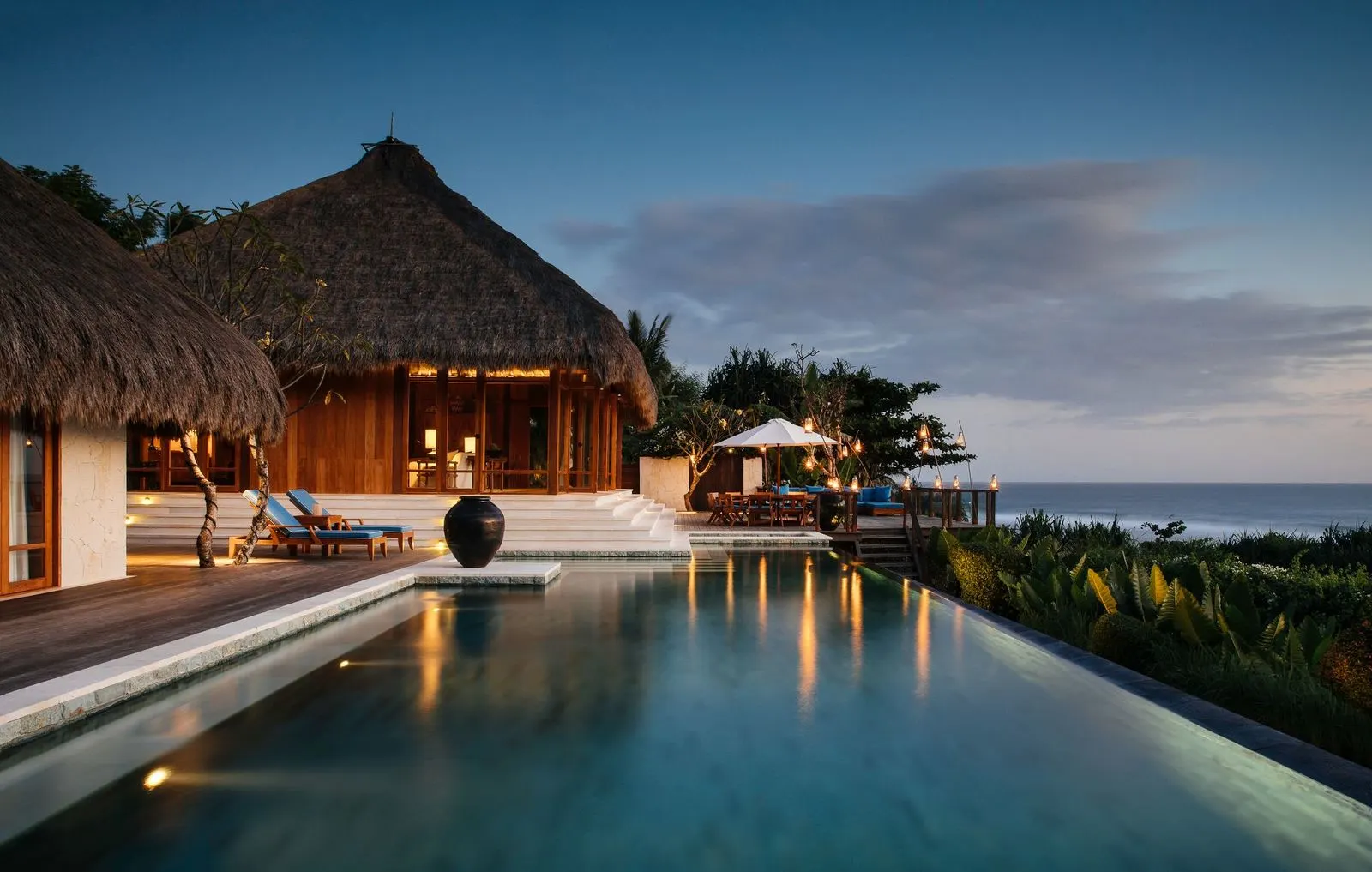 NIHI Sumba villa pool at dusk overlooking the Indian Ocean