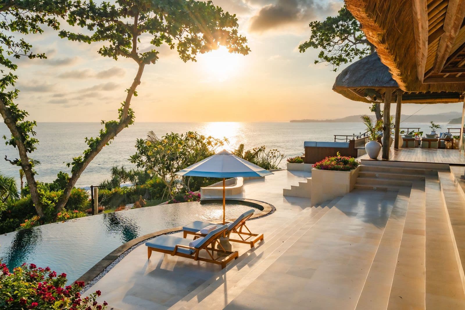 Cliffside infinity pool at sunset overlooking the Indian Ocean